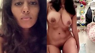 Busty Indian woman displays her assets