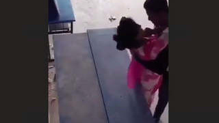 Indian couple's intimate moment in a classroom