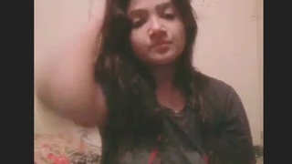 A stunning woman makes a video for her beloved