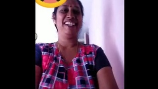 Elderly wife shows her breasts to her partner through a webcam