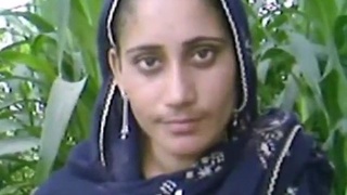 A seductive mother and her son engage in passionate outdoor intimacy