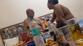 Elderly gentleman and Randi in intimate encounter