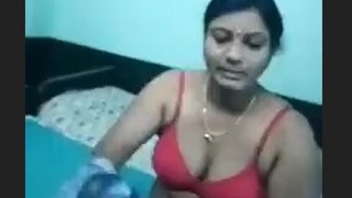 Several aunts engage in a sensual Tamil oral sex session with an older man