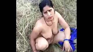 Village aunty engages in sexual activity for financial gain outdoors