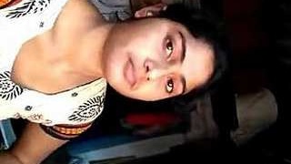 An aroused Indian woman uses Petroliam Jel to stimulate her vagina and anus with her fingers