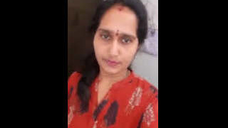 A mature Indian woman teases with her buttocks