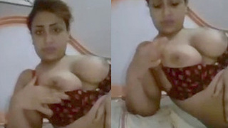 Arousing Arab housewife with large breasts indulges in sensual play