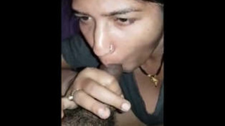 A married woman giving a skilled blowjob