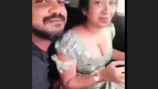 A passionate Desi couple's erotic ride in a car