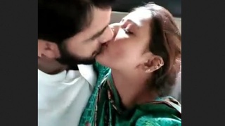A mischievous Pakistani couple indulges in intimate activities inside a vehicle