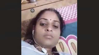 Horny Bhabi fondles her breasts during a video call