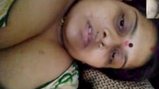 Bhabi displays her large breasts during a video chat