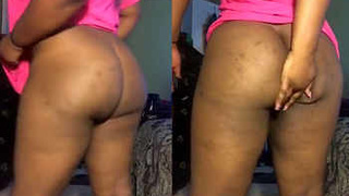 African American mature woman exposing buttocks