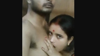 Passionate couple's rendezvous in a picturesque village