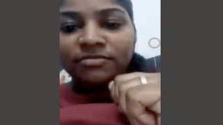 A girl from Tamil origin pleasuring herself through fingering during a video call