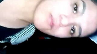 Aroused girlfriend moistures her vagina with her fingers