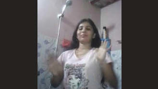 A seductive Indian beauty takes a bath