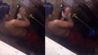 A sultry Indian beauty takes a steamy bath