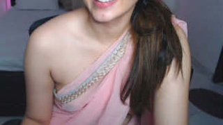 Arelative in a sheer saree reveals her fair breasts and speaks explicitly about them