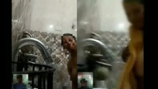 Indian plus-size woman taking a bath during a video chat