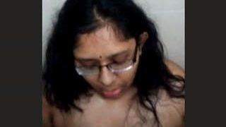Indian wife gives a sensual blowjob in the bathroom