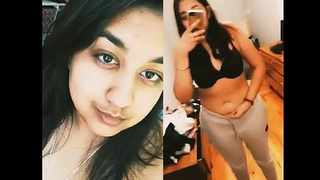 Punjabi woman displays her belly button and breasts sensually