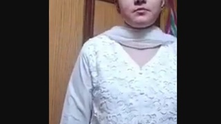 A Pakistani woman's nude performance in an extended video