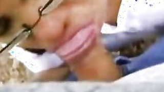 Young Indian girl sucking her lover's cock in the park