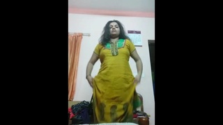 Indian aunt changes clothes in bedroom