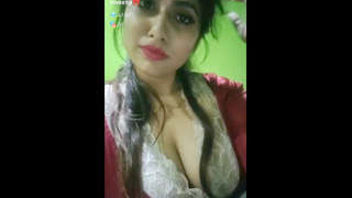 Sweety, a Bengali housewife, reveals her breasts in a seductive tango
