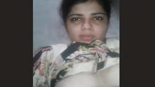 Aroused South Asian housewife pleasuring herself