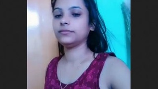 Desi beauty reveals her moist pussy and alluring breasts