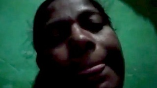 Village bhabi pleasures herself by touching her moist pussy