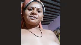 Indian aunty takes nude selfies on camera