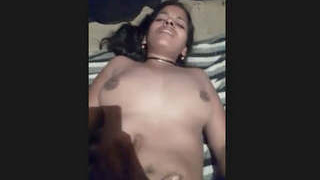 Indian spouse is vigorously penetrated by her spouse in a rural setting