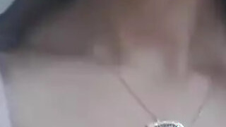 Naughty black girl loves to suck her own tits while rubbing her pussy