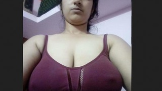 Attractive Southern Indian woman undresses for self-portrait