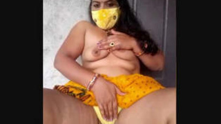 Indian housewife Geeta displays her body on the upper terrace