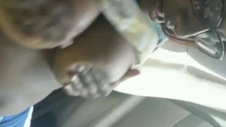 South Asian woman gives oral sex in a vehicle