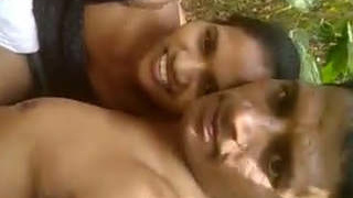 A couple from a small town enjoys outdoor intimacy and breast fondling