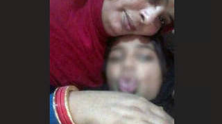 Indian mature woman with large breasts undressing