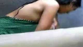 Video of a Tamil woman taking a bath