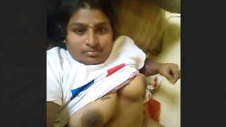 Indian aroused wife pleasuring herself with her fingers