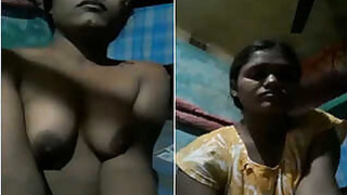 Desi Indian woman shows her pussy and plays with huge tits