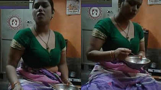 Elderly woman's breasts exposed in traditional Indian garment