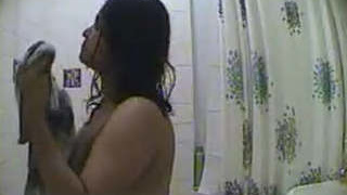 Hidden camera captures adorable Indian girl dressing after bath